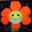 Blacklight Orange field flower puppet 